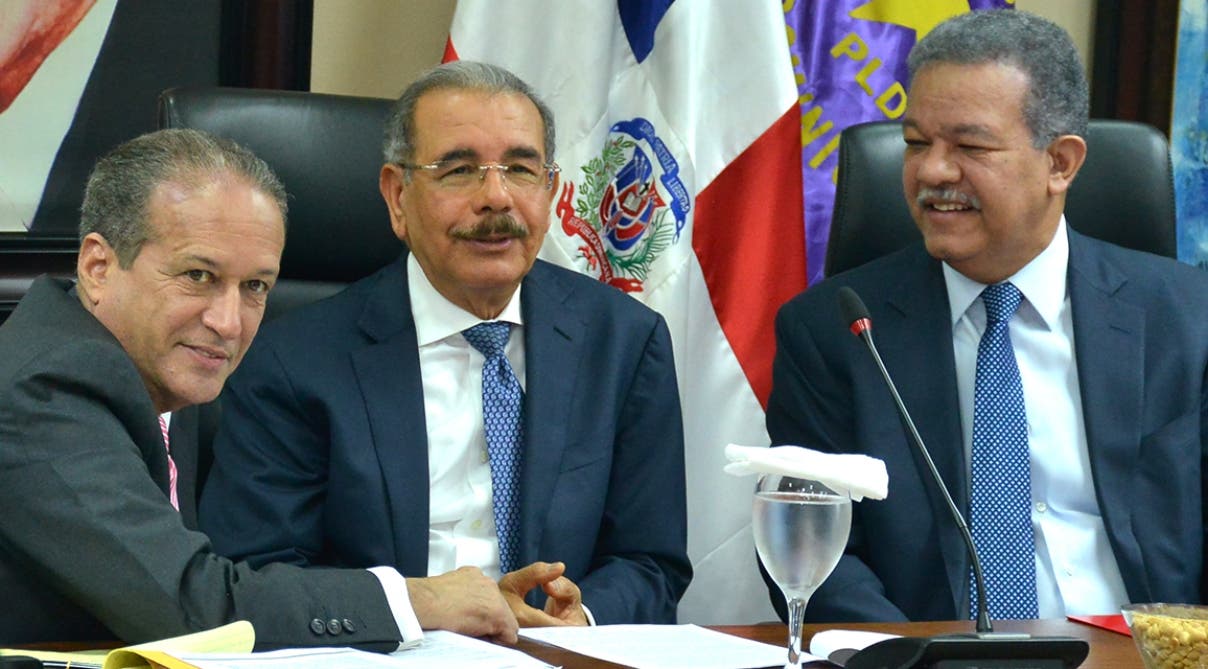Reinaldo Pared Pérez, el presidente Danilo Medina y el expresidente Leonel Fernández.