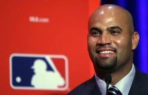 Albert Pujols demanda a Jack Clark