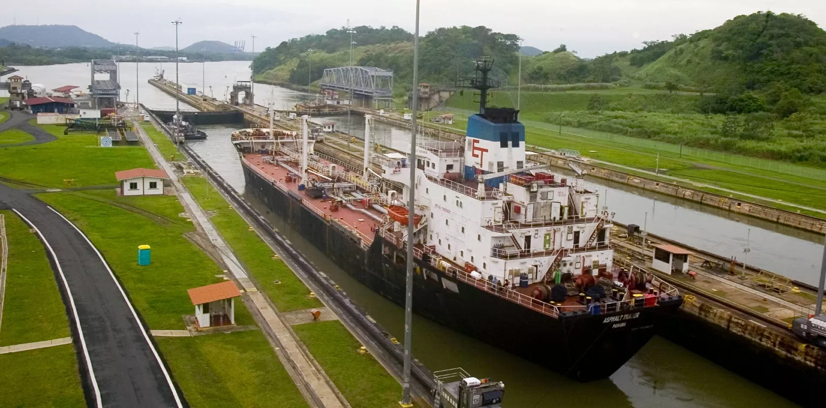 A Cargo ship leaves the Panama Canal Miraflores locks, heading toward the Pacific Ocean, in Panama C..
