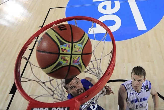 Dominican Republic’s forward Francisco Garcia (L) vies with Finland’s guard Teemu Rannikko (R) during the 2014 FIBA World basketball championships group C match Finland vs Dominican Republic at the Bizkaia Arena in Bilbao on September 2, 2014. Dominican Republic won 74-68. AFP PHOTO/ ANDER GILLENEA