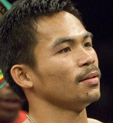 BOXING: PACQUIAO DETHONES MARQUEZ TO CLAIM SUPER FEATHER TITLE