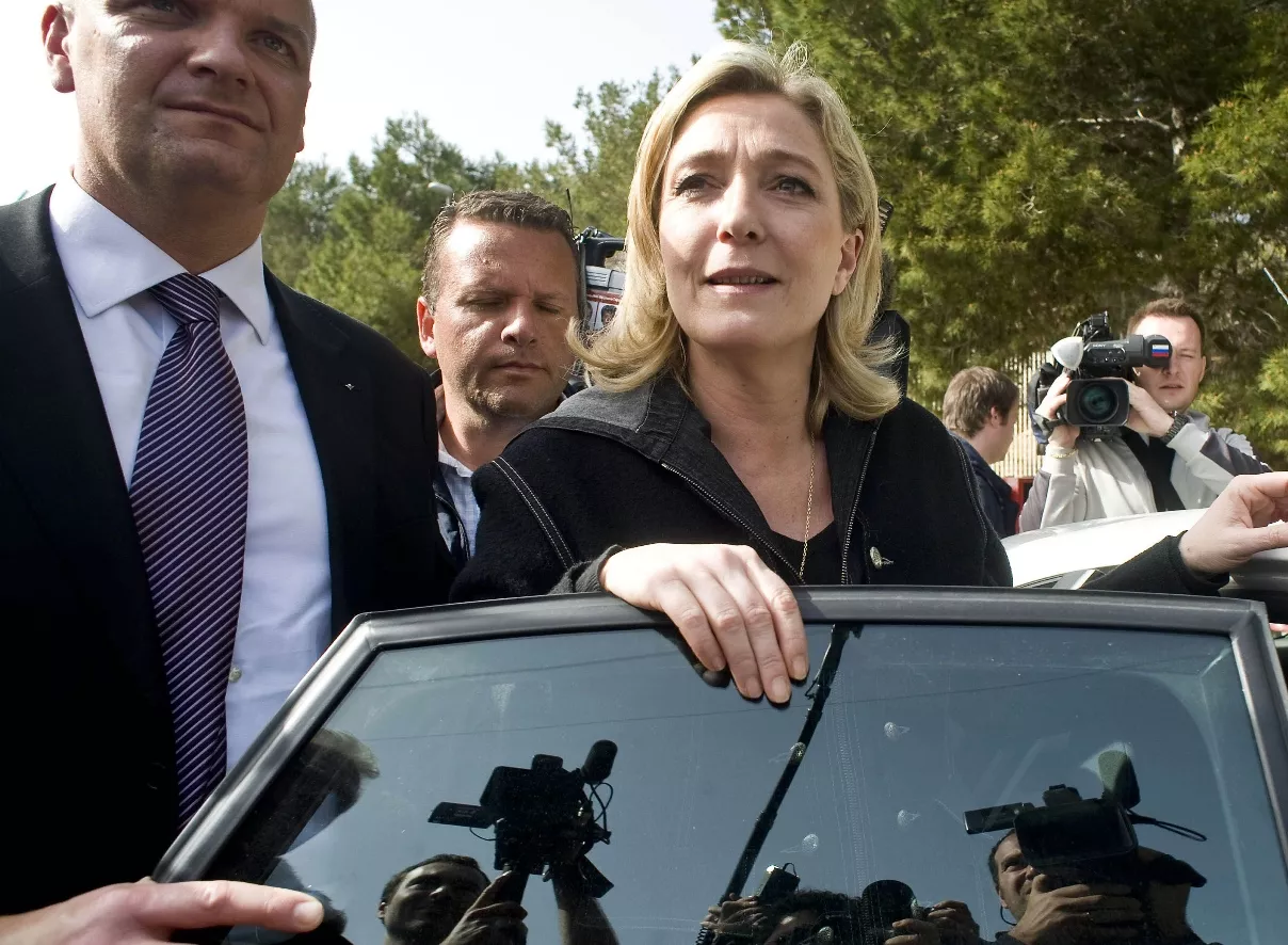 Italy Migrants Le Pen