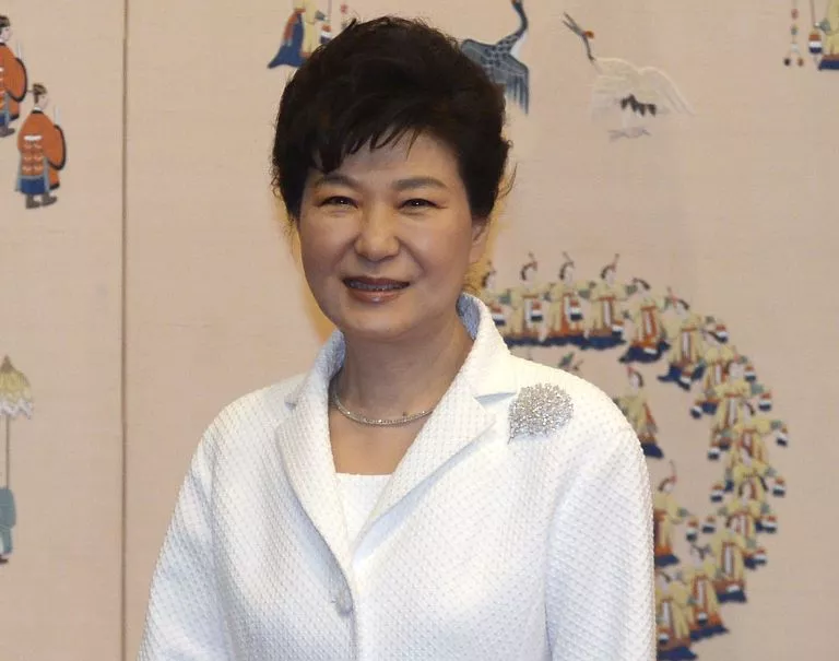 South Korean President Park Geun-Hye (R) shakes hands with Turkmenistan’s President Gurbanguly Berdymukhammedov (L) before their meeting at the presidential Blue House in Seoul on April 13, 2015. Berdymukhammedov is in Seoul to discuss economic exchanges and to strengthen bilateral relationships in trade, culture and diplomacy. AFP PHOTO / POOL / SONG KYUNG-SEOK
