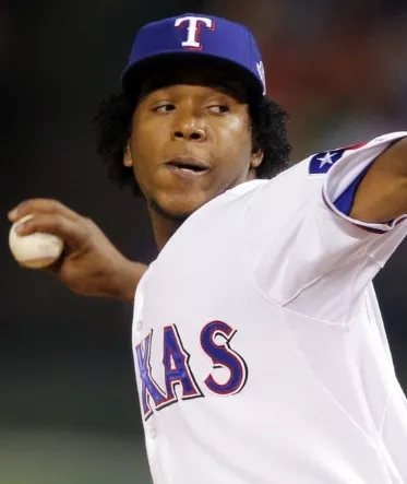 Texas Rangers relief pitcher Feliz pitches to the  Giants during Game 5 of Major League Baseball’s World Series in Arlington