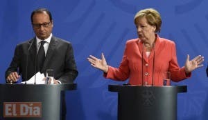 Merkel y Hollande buscan respuesta a la crisis migratoria