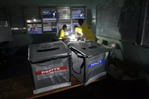 Election officials prepare the ballots for voters at a school in Port-au-Prince, Haiti, on August 9, 2015, during the Legislatives Elections.After nearly four years of delays, Haiti staged legislative elections Sunday in a vote overshadowed by fears of violence and poor turnout. Polling stations opened at 6:00 am (1000 GMT) for the first time since President Michel Martelly came to power in May 2011. The poorest country in the Americas, Haiti suffers from a history of chronic instability and is still struggling to recover from the devastating 2010 earthquake. AFP PHOTO/HECTOR RETAMAL