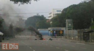 Hieren de perdigones a fotorreportero de El Caribe durante protesta en la UASD