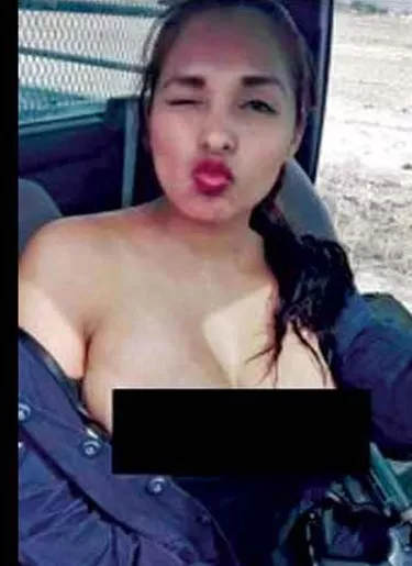 Mujer policía  posa en toples y es suspendida