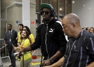 Atleta jamaiquino Usain Bolt llega a Río con aura de triunfo