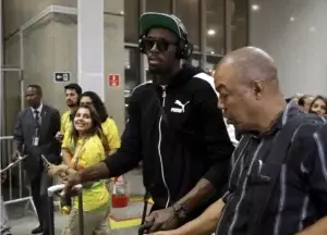 Atleta jamaiquino Usain Bolt llega a Río con aura de triunfo