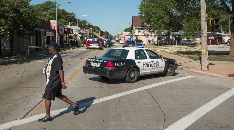 Violence Erupts In Milwaukee After Police Officer Shoots Armed Suspect During Foot Chase