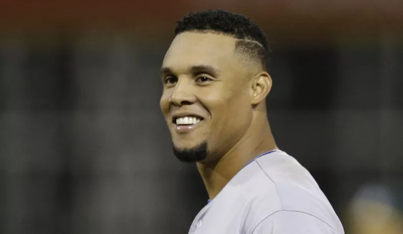 Dominicano Carlos Gómez ficha con los Rays de Tampa Bay en Grandes Ligas