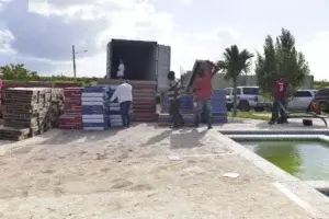 Aduanas recupera 893 de los televisores robados en contenedor Boca Chica