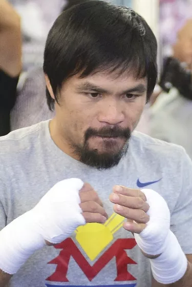 Manny Pacquiao está detrás de combate ante Amir Khan