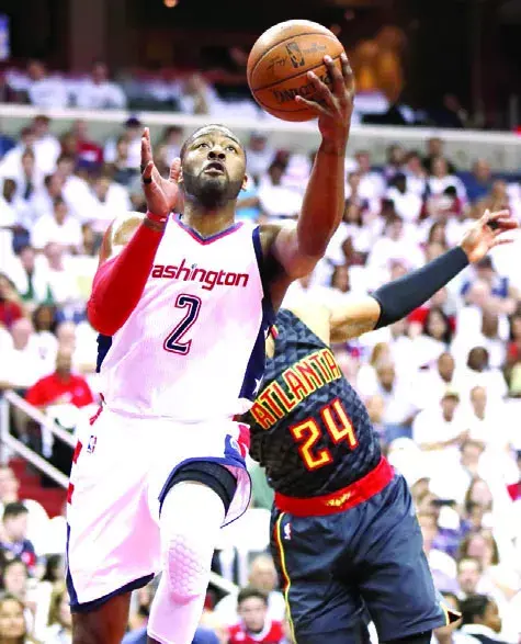 Wall guía triunfo de Wizards sobre Hawks