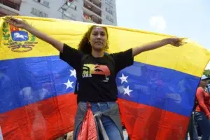 Aún dolida por las protestas, Venezuela acude a elecciones regionales