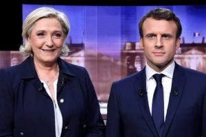 Macron se refuerza frente a Le Pen tras violento debate televisivo