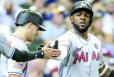 Marcell Ozuna dispara dos cuadrangulares