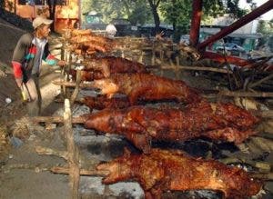 Cerdo en puya, tradición en Nochebuena de los dominicanos