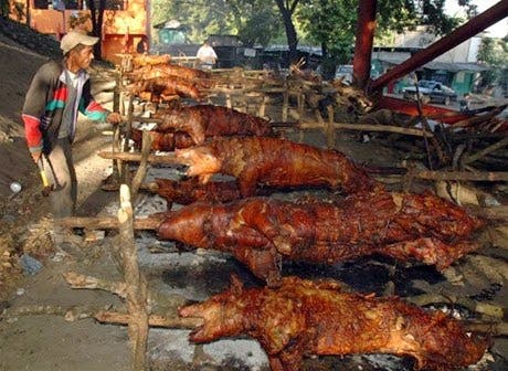 Cerdo en puya, tradición en Nochebuena de los dominicanos