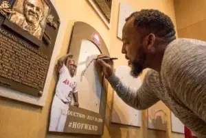 Vladi firma su placa estará Cooperstown