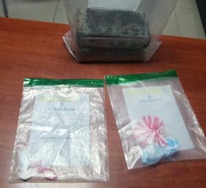 DNCD incauta dos kilos de cocaina, propiedades y vehículos