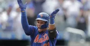 El dominicano Carlos Gómez marca la victoria de los Mets con hit impulsador