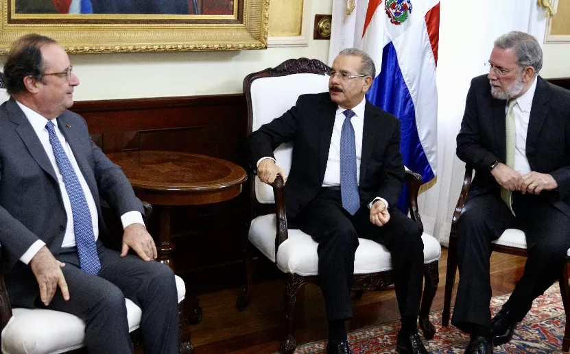 Hollande visita a Danilo y Leonel