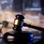 Jueza envía a juicio de fondo a estudiante de la UASD por ultimar a seguridad de la Alta Academia y herir a otros
