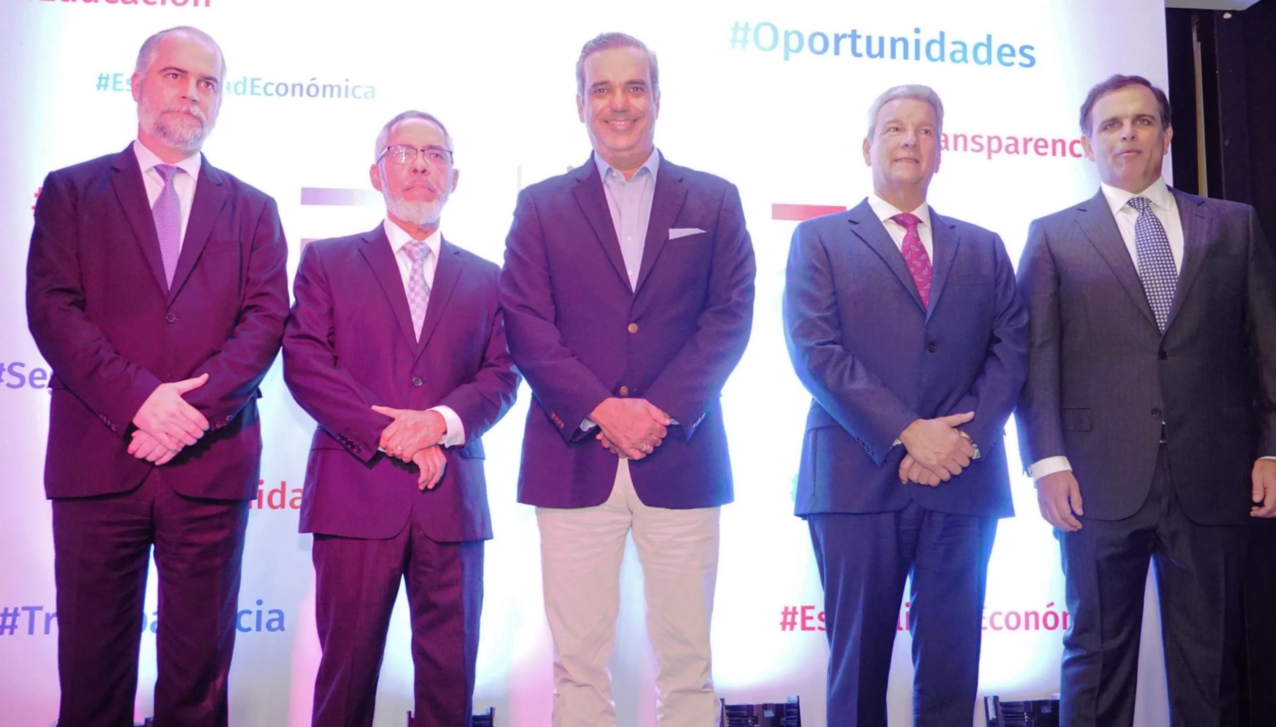 Tres economistas se integran  al equipo  de Luis Abinader