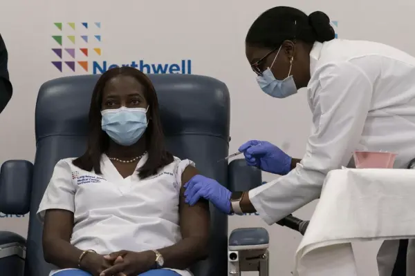 First person receives COVID-19 vaccine in the US