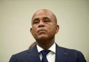 Grupos de izquierda declaran Martelly persona no grata en el país