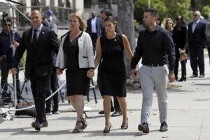 FILE - Members of Los Angeles Angels pitcher Tyler Skaggs' family, including his mother Debbie Hetman, second from right, and stepfather Danny Hetman, far left, enter the St. Monica Catholic Church for a memorial for Skaggs in Los Angeles, in this Monday, July 22, 2019, file photo. The family of former Los Angeles Angels pitcher Tyler Skaggs filed lawsuits Tuesday, June 29, 2021, in Texas and California charging the team and two former employees with negligence in his drug-related death two years ago. Skaggs, 27, was found dead in a suburban Dallas hotel room on July 1, 2019. (AP Photo/Marcio Jose Sanchez, File)