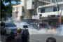 Policía dispersa marcha de peledeistas con bombas lacrimógenas próximo a Palacio de Justicia