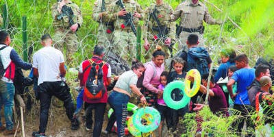 México promete a Biden ayuda con ola migratoria