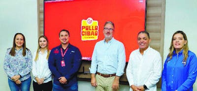 Ejecutivos de Pollo Cibao reciben visita de directivos