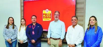 Ejecutivos de Pollo Cibao reciben visita de directivos