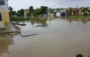 Residentes de Prado de la Caña piden auxilio de la CAASD y MOPC frente a la tormenta Franklin