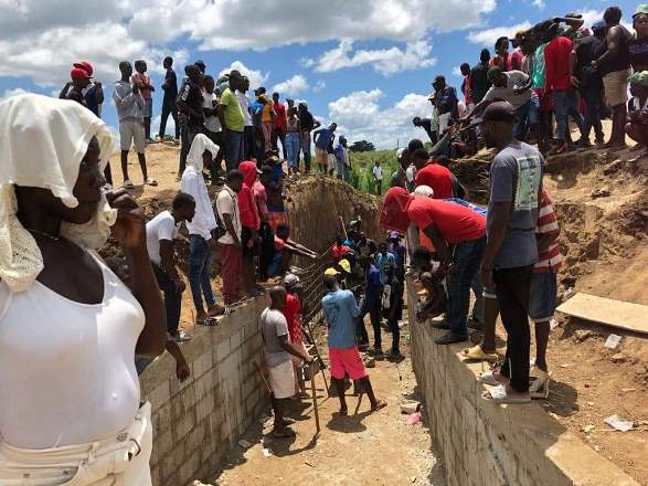 Haitianos continúan construcción de canal en río Masacre