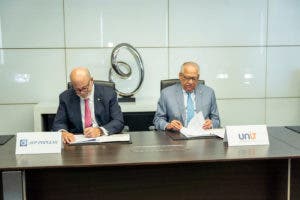 AFP Popular firma acuerdo interinstitucional con UNIT