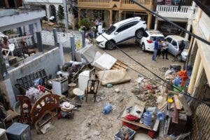 Suben a 14 los muertos por las lluvias más copiosas registradas en RD