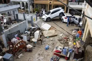 Suben a 14 los muertos por las lluvias más copiosas registradas en RD