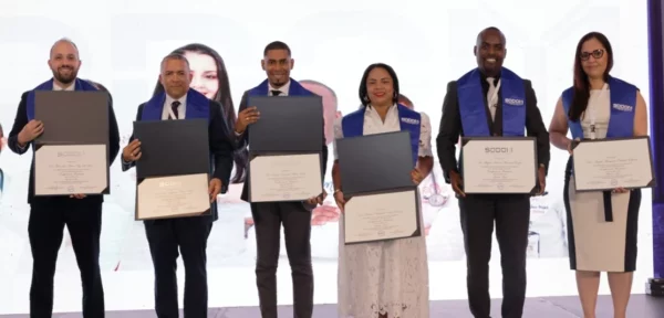 Ángela Cabreja Espinal, presidenta de SODOM, junto a otros miembros de la entidad.