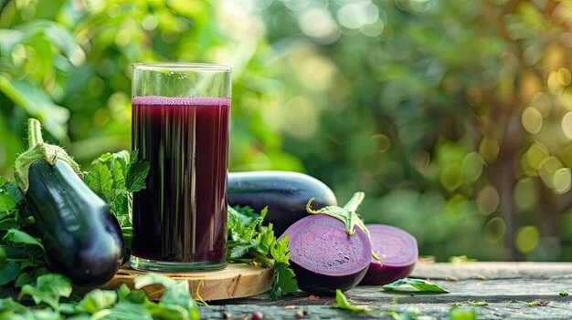 freshly-squeezed-eggplant-juice-background-garden-selective-focus_847296-31689