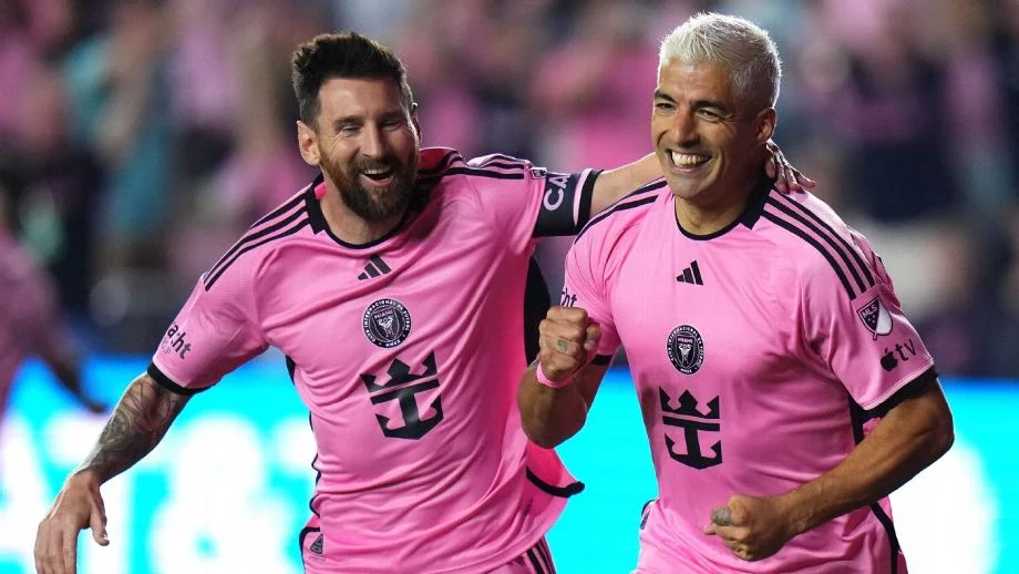luis suarez y messi