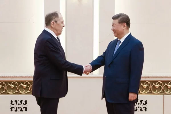 Xi Jinping y Lavrov.