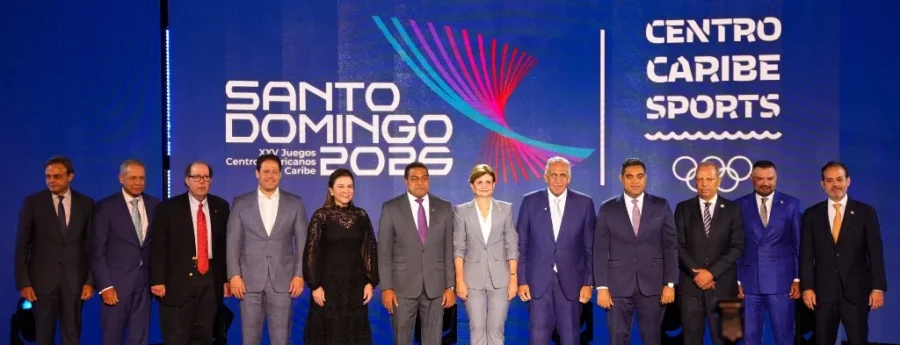 De izquierda a derecha: José Manuel Ramos, Fernando Langa, Felipe Vicini, Carlos Bonilla,  Carolina Mejía, José P. Monegro, Raquel Peña, Luisín  Mejía, Kelvin Cruz, Gary Bautista,  Andrés Vander Horst y Carlos Iglesias, durante la presentación oficial de los XXV Juegos Centroamericanos y del Caribe, Santo Domingo 2026,  en el Pabellón de la Fama del Deporte Dominicano.