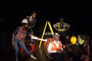 Escena de la obra teatral Se busca un hombre honesto