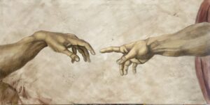 La creación de Adan, del maestro renacentista Miguel Ángel Buonarroti.