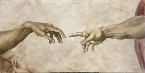 La creación de Adan, del maestro renacentista Miguel Ángel Buonarroti.